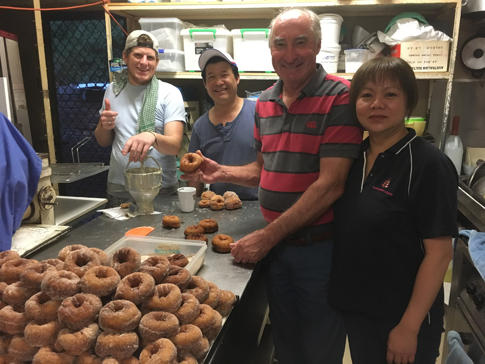 Caleb Shaw, Joe Nguyen, Phillip McDonald and Quyen Nguyen making donuts to raise funds. Picture: Supplied