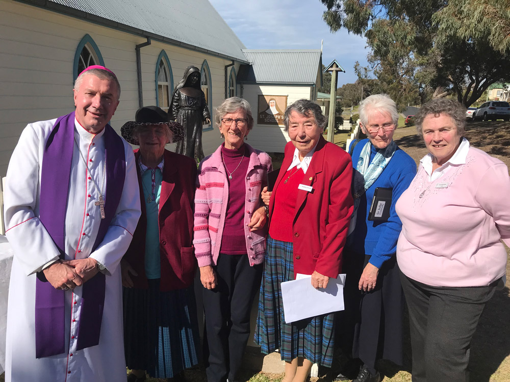 Archbishop Prowse with some Josephite Sisters outside Mary MacKillop Museum in Eden