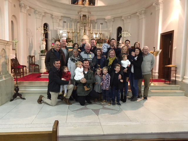 Pat Keough surrounded by his family.