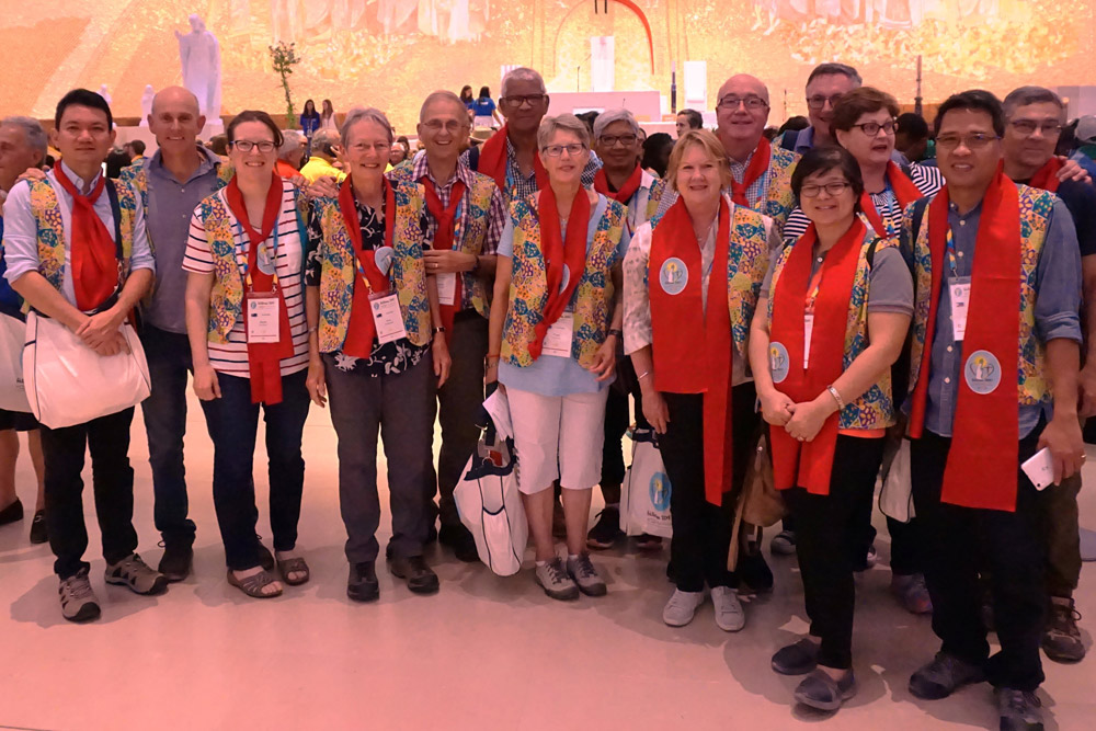 Couples from Canberra, Sydney and Philippines, taken in the Basilica of the Most Holy Trinity. (L to R): Fr Cris Cagabcab (Phil), Mark Stoove, Sarah Stoove, Sue Fordham, Adrian Fordham, Maxime Juste (Syd), Faye Noonan, Jocelyne Juste(Syd), Carol Laslett, John Laslett, Kevin Noonan, Muyen Delos Reyes (Phil) Helena Paul, Edlin Delos Reyes (Phil), Roger Paul