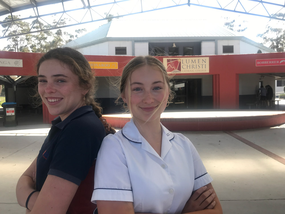 Julia Cullenward (left) and Ambrosia Kleber (right), two of the four Lumen Christi students who created the video "Enough is Enough". Absent from this photo: Annalise Piotrowski and Phillipa Keogh.